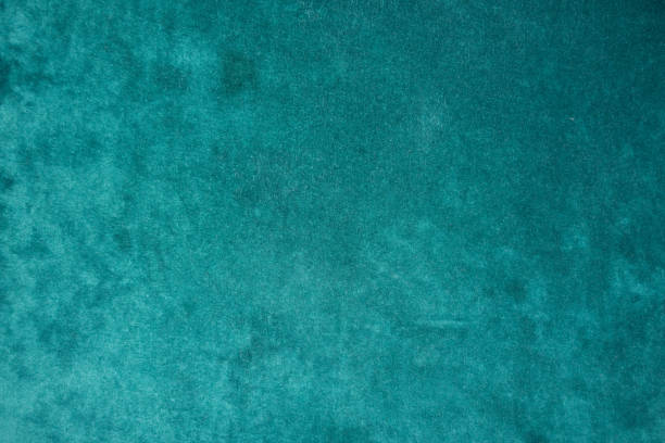 Top view of dark green velour fabric Top view of dark green velour fabric teal stock pictures, royalty-free photos & images