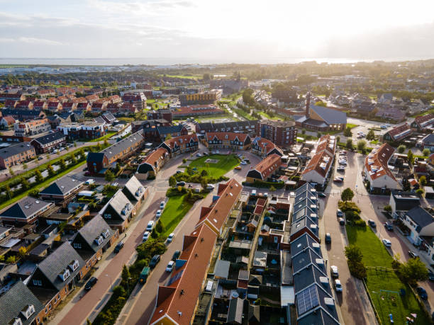 Top view of house Village from Drone capture in the air house is brown roof top Urk netherlands Flevoland Top view of house Village from Drone capture in the air house is brown roof top Urk netherlands Flevoland. High quality photo with drone flevoland stock pictures, royalty-free photos & images