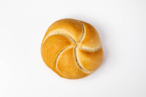 Top view of Kaiser roll on white table. stock photo
