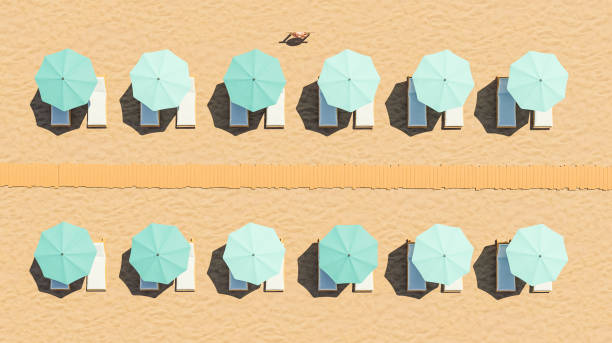 top view of umbrellas on the beach stock photo