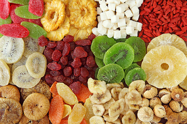 Top view of variety of dried fruits Mix of dried fruits close up dried fruit stock pictures, royalty-free photos & images