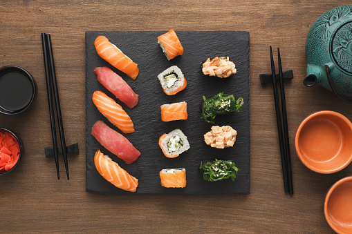 Top View Set Of Sushi Maki And Rolls Near Teapot Stock Photo - Download Image Now - iStock