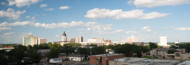 Topeka Kansas Capital Capitol Building Downtown City Skyline Soft clouds and blue skies appear over Topeka, Kansas USA topeka stock pictures, royalty-free photos & images