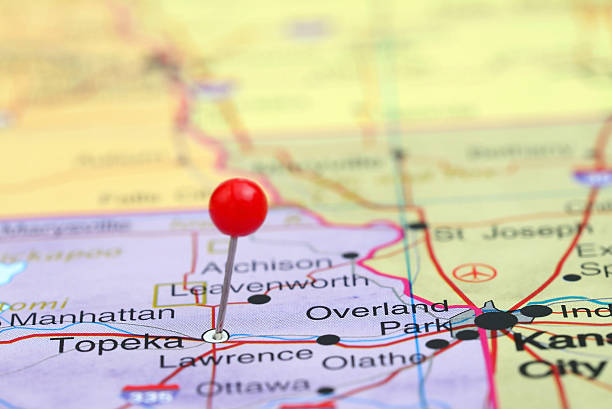 Topeka pinned on a map of USA Photo of pinned Topeka on a map of USA. May be used as illustration for travelling theme. topeka stock pictures, royalty-free photos & images