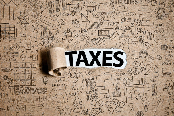 TAXES  /  Torn Paper Concept (Click for more) stock photo