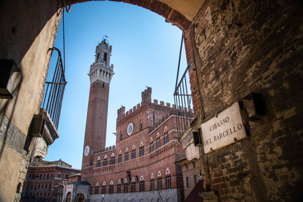 Torre del Mangia, Palazzo Pubblico, Piazza del Campo, Siena, Italy stock photo