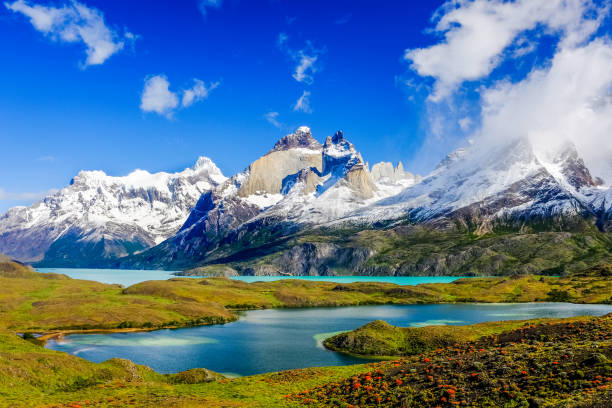 Torres del Paine, Chile. Beautiful Patagonia landscape of Andes mountain range, winding road and lake at Torres del Paine National Park, Chile. andes stock pictures, royalty-free photos & images