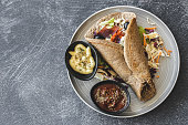 Tortilla wrap with organic vegetable on dark background
