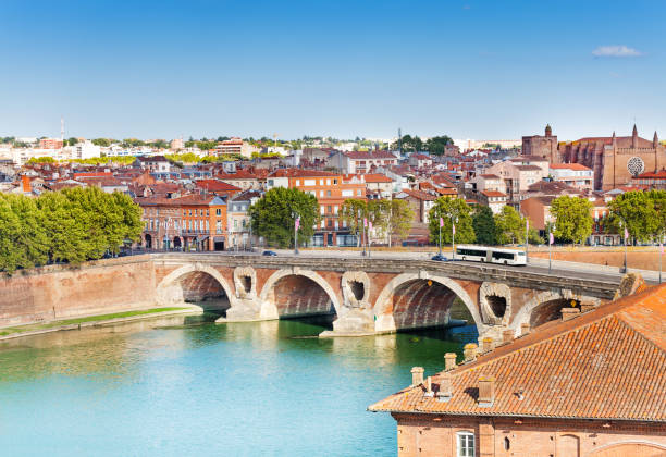Toulouse and Pont Neuf bridge across Garonne river stock photo