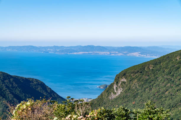 A tourist destination in Japan. The scenery on the sea side seen from the mountain in Unzen City, Nagasaki Prefecture. A tourist destination in Japan. The scenery on the sea side seen from the mountain in Unzen City, Nagasaki Prefecture. nagasaki prefecture stock pictures, royalty-free photos & images
