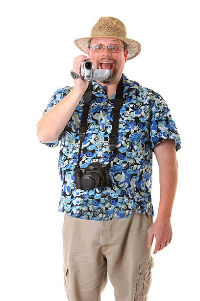 tourist with video camera stock photo