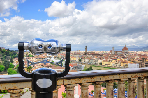 Touristic binoculars and view of Florence