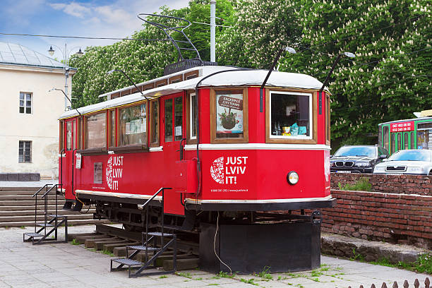Touristic coffee tram Lviv, Ukraine - May 8, 2016: A touristic tram near "The Arsenal" which is a shop to buy different things and souvenirs and also coffee, Lviv, Ukraine Arsenal stock pictures, royalty-free photos & images