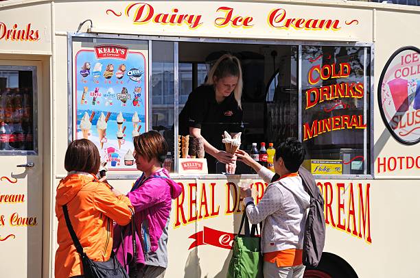 Tourists buying ice cream, Liverpool. stock photo