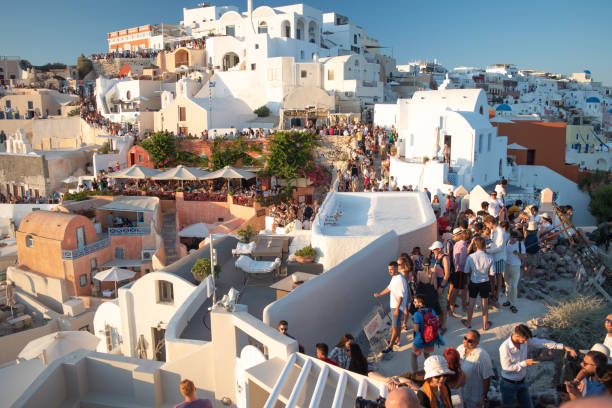 Tourists packed into Santorini due to over-tourism stock photo