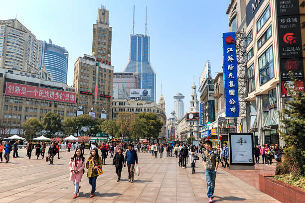 Tourists walking in Nanjing Road in Shanghai stock photo