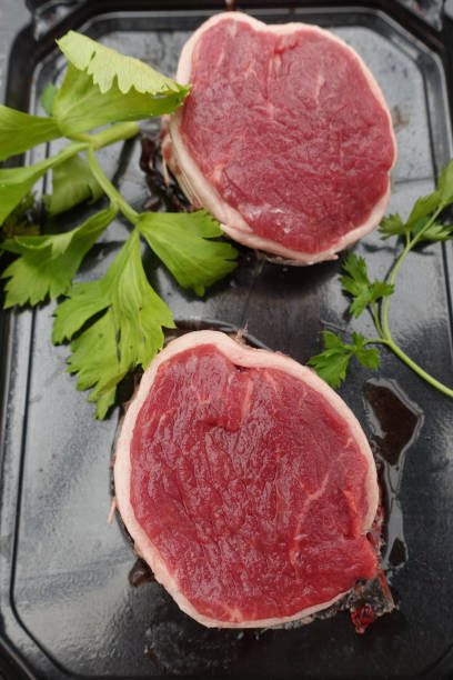Tournedos barded beef ready to cook  Charolais beef  Raw food stock photo