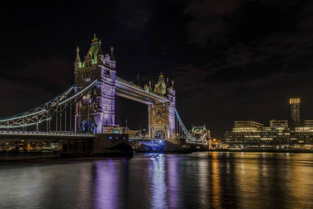Tower Bridge at night in London stock photo