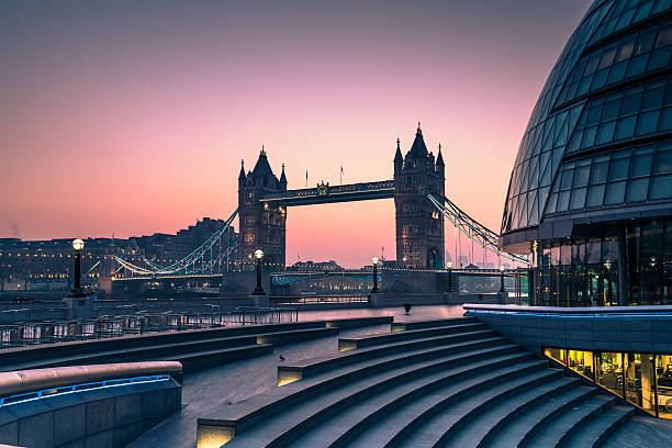 Tower Bridge in London, view from Southwark. Tower Bridge in London at sunrise , view from Southwark . tower bridge stock pictures, royalty-free photos & images