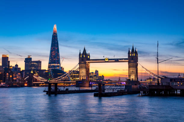 Tower Bridge Sunset A beautiful sunset shot looking over the Thames towards Londons iconic Tower Bridge and on towards the Shard. tower bridge stock pictures, royalty-free photos & images