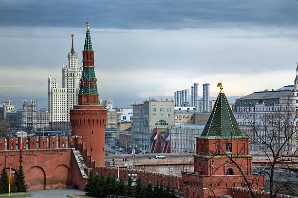 Towers of the Moscow Kremlin and Stalin architecture at the background stock photo