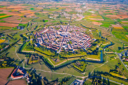 Town of Palmanova defense walls and trenches aerial view, UNESCO world heritage site in Friuli Venezia Giulia region of Italy