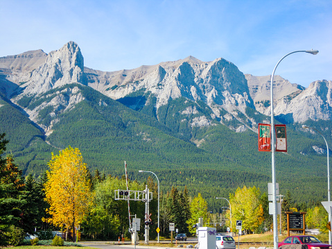 Townscape and Mountain range of Canmore in autumn, Kananaskis Country, Canadian Rockies, Alberta, Canada