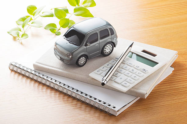 toy car and calculator - car financing bildbanksfoton och bilder