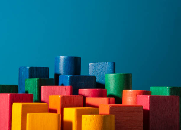 Toy of colored wood blocks. Skyscraper metaphor stock photo