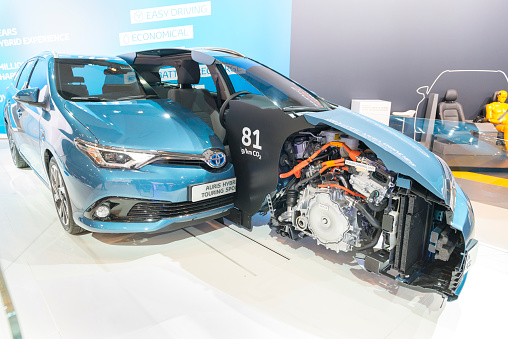 Brussels, Belgium - Januari 12, 2016: Motor show demonstration model of a Toyota Auris Hybrid Sports cross section showing the hybrid powertrain with the petrol engine and the electric engine. The car is on display during the 2016 Brussels Motor Show.