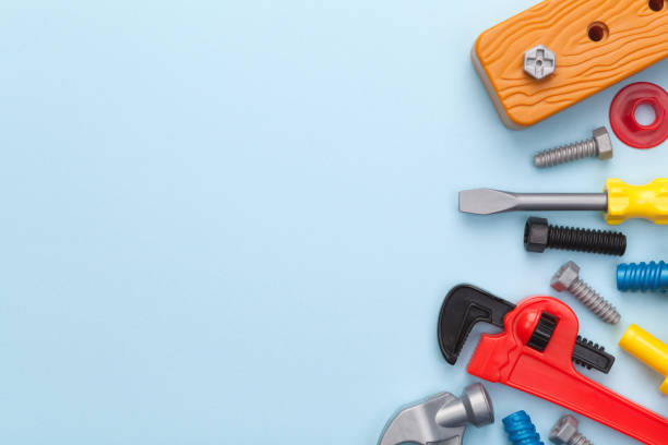 toys tools on blue background - plastic hammers imagens e fotografias de stock