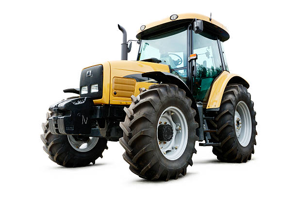 Tractor New unused farm machine - isolated on white with soft shadow + clipping path tractor stock pictures, royalty-free photos & images