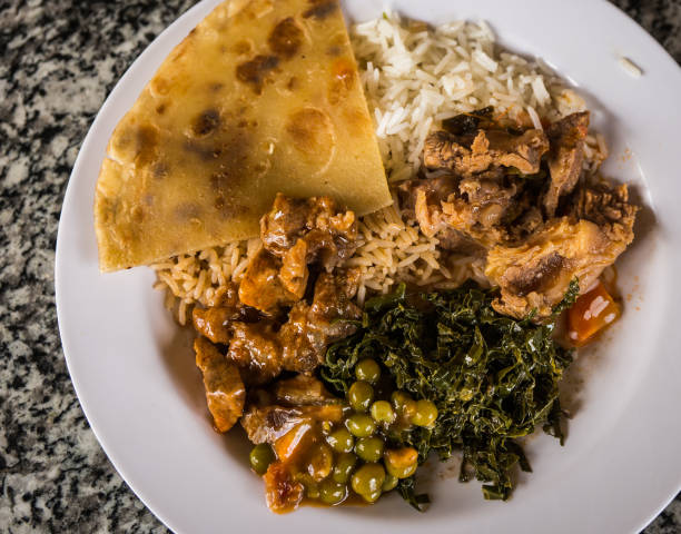 Traditional African dinner on  plate in Kenya stock photo