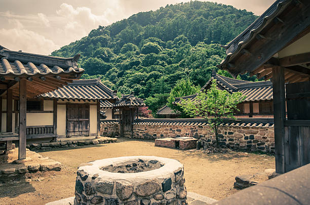 Traditional Asian Village The courtyard in a traditional village in Asia. thomas wells stock pictures, royalty-free photos & images
