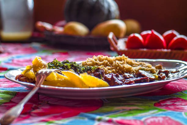 Traditional Brazilian dish - feijoada - much appreciated and incorporated in the country's culinary tradition. Selective focus. stock photo