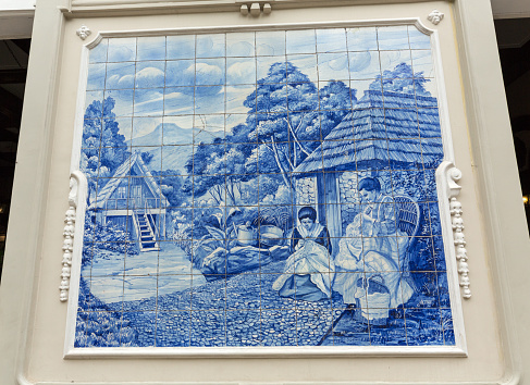 Funchal, Madeira, Portugal - September 2, 2016: Traditional ceramic tiles in  Funchal on Madeira depicting local life.