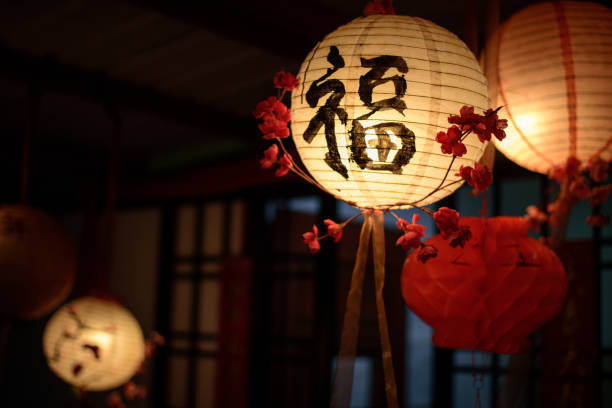Image of Traditional Chinese lanterns with cherry blossom.