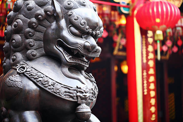 Traditional Chinese Metal lion sculpture in temple stock photo