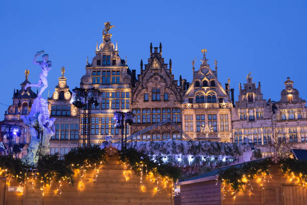 Traditional Christmas market in Europe. Antwerp, Belgium Gift shops at Christmas fair, Antwerp main square. Holidays concept brugge belgium stock pictures, royalty-free photos & images