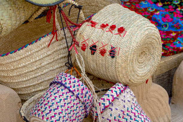 Traditional handcrafts jute straw baskets stock photo