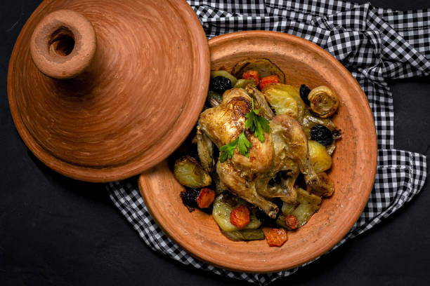 Traditional homemade chicken tajin stew with potatoes stock photo
