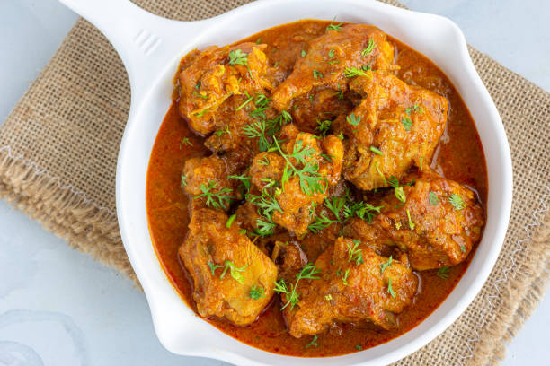 Traditional Indian Chicken Curry Top Down Close-Up Photo stock photo
