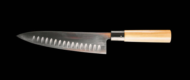 Traditional Japanese gyuto chief knife isolated on black Traditional Japanese gyuto chief knife isolated on black background Deba knife stock pictures, royalty-free photos & images
