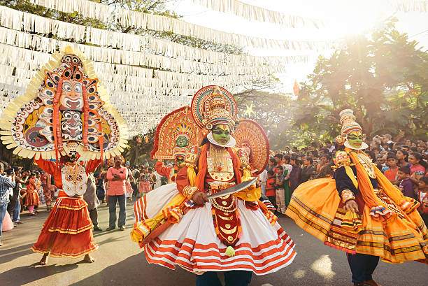 Traditional Kathakali dance on New Year carnival Kochi, India - January 1, 2016: Traditional Kathakali dance on New Year carnival in Fort Kochi (Cochin), Kerala, India. Kochi, formerly known as Cochin, is a city and port in the Indian state of Kerala. One of the famous events here is Cochin New Year Carnival, since 1984 at Fort Kochi. It is celebrated at Fort Kochi every year during the last ten days of December. There are massive procession of caparisoned elephants, games and partying. kathakali stock pictures, royalty-free photos & images