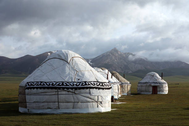 Traditional Kyrgyz tents Yurt. Song Kol Lake, Kyrgyzstan. Traditional Kyrgyz tents Yurt. Song Kol Lake, Kyrgyzstan. tien shan mountains stock pictures, royalty-free photos & images