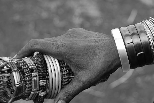 Traditional Masai bracelets Masai jewelry. Black and white photo. masai warrior stock pictures, royalty-free photos & images