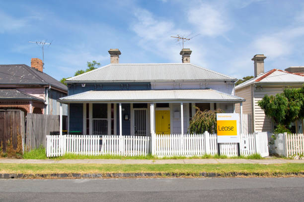 Traditional Semi-detached House with a white picket fence - Melbourne stock photo