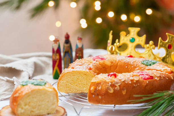 Traditional Spanish Epiphany cake, Roscon de Reyes with festive decorations stock photo
