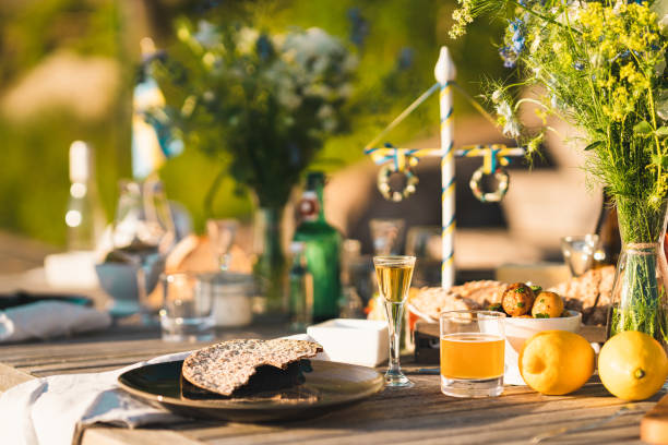 Traditional Swedish midsummer food Food on the table at the traditional Swedish midsummer holiday. swedish flag photos stock pictures, royalty-free photos & images