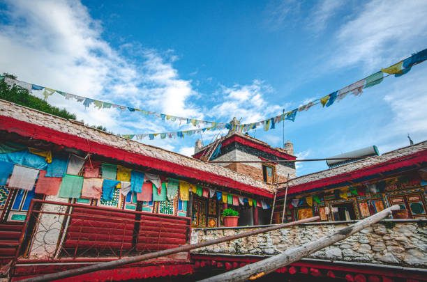 Traditional Tibetan houses hanging with prayer flags stock photo